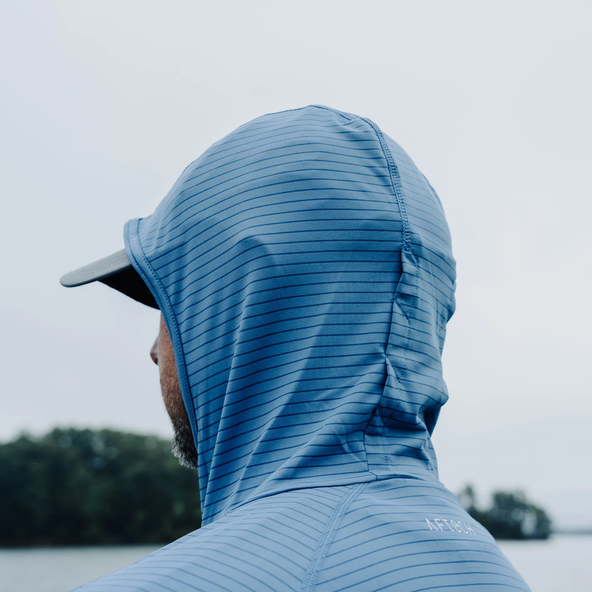 Channel Hooded Performance Shirt - Image 12